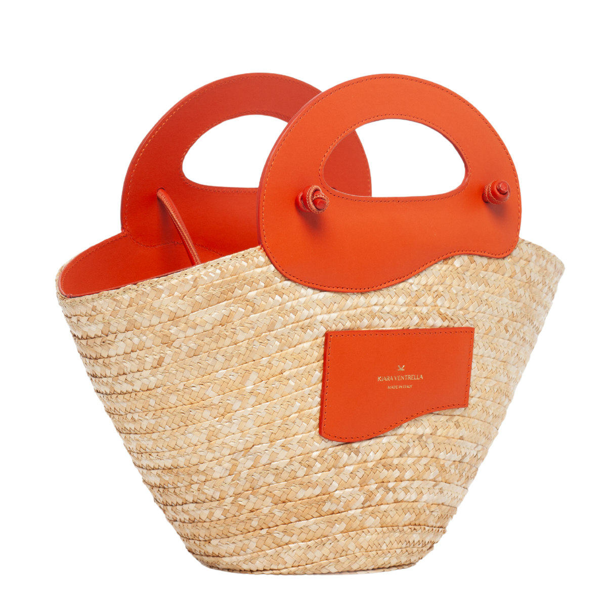 3/4 View: Marea Straw Bag Small, Smooth Orange Leather (Toasted Orange), Leather Strobel Tube Shoulder Strap, Leather Wave handles.
