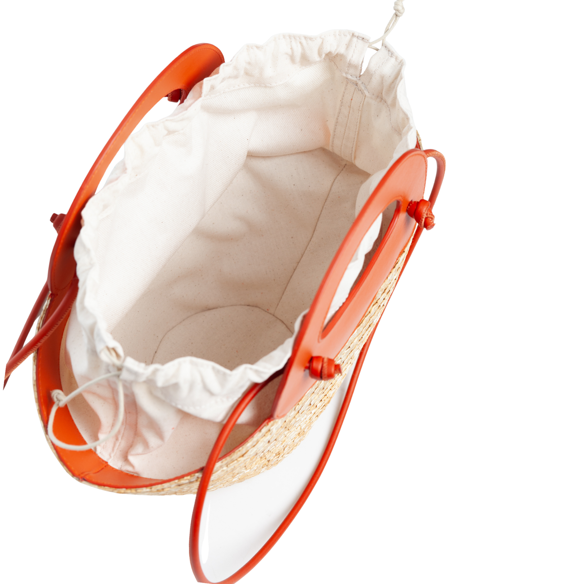 Interior: Interior of Marea Small Straw Bag showing canvas lining with open drawstring closure.