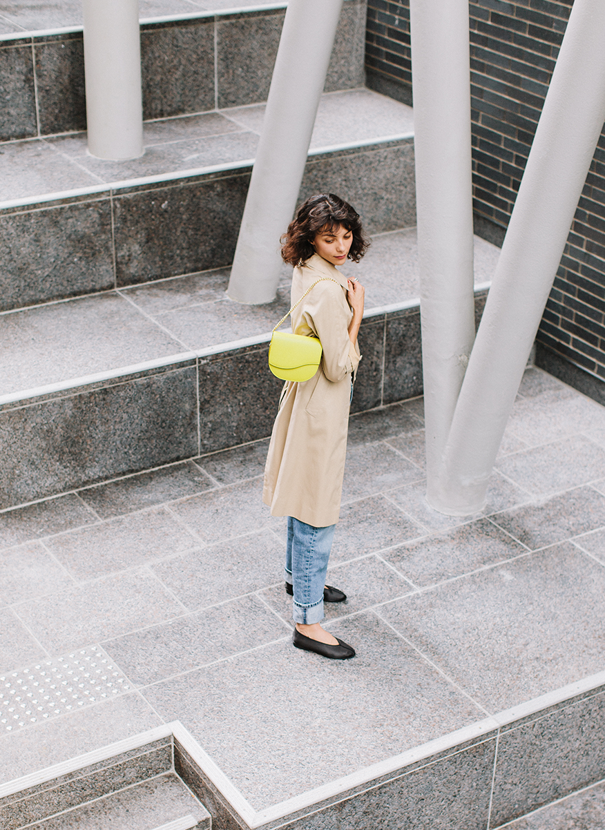 Ariana Wave Saddle, Pebble Chartreuse leather lifestyle worn as a chain shoulder bag