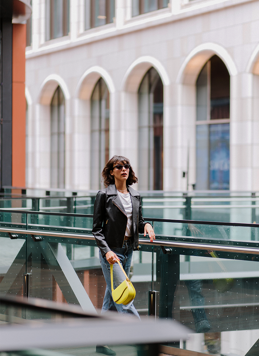 Ella Wave Saddle Bag in Pebbled Chartreuse worn as a shoulder bag