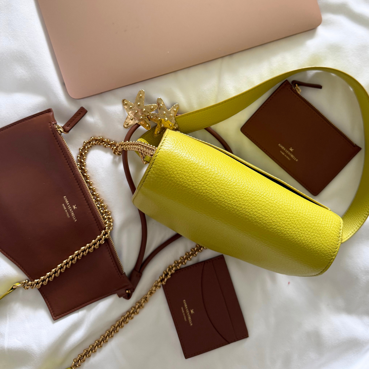 Lifestyle: Card Case Slim Smooth Brown leather (Chestnut), small leather goods, SLGs, Flat Lay, laptop, Marea Wave Pouch, Extra Credit Cardholder, Ella Wave Saddle in Chartreuse.